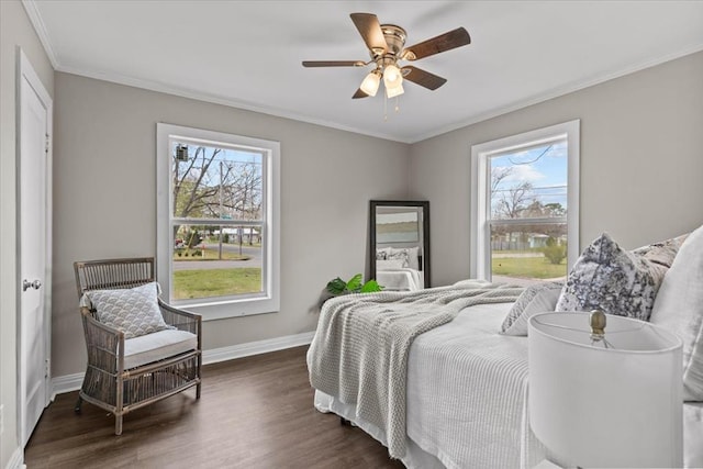 1301 S Bell St, Dothan, AL 36301 - bedroom featuring multiple windows, dark wood finished floors, baseboards, and crown molding