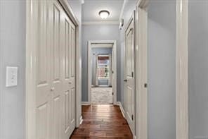 hall with dark wood-style flooring