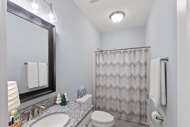 full bathroom with toilet, shower / bath combination with curtain, and vanity