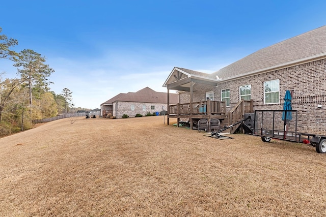 view of yard with a deck