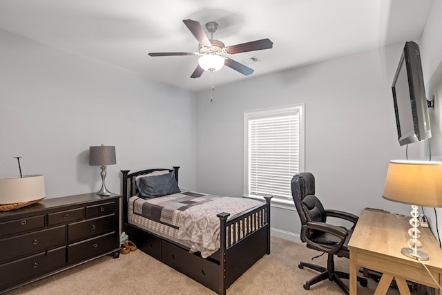 bedroom featuring ceiling fan and light colored carpet