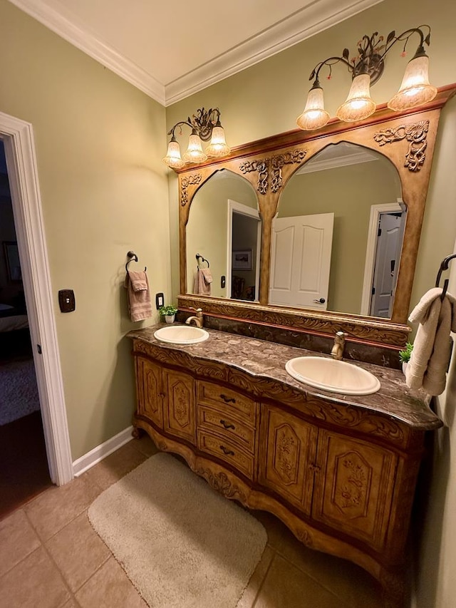 bathroom with vanity, tile patterned floors, and crown molding