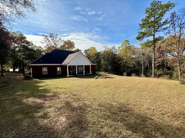 exterior space with a lawn