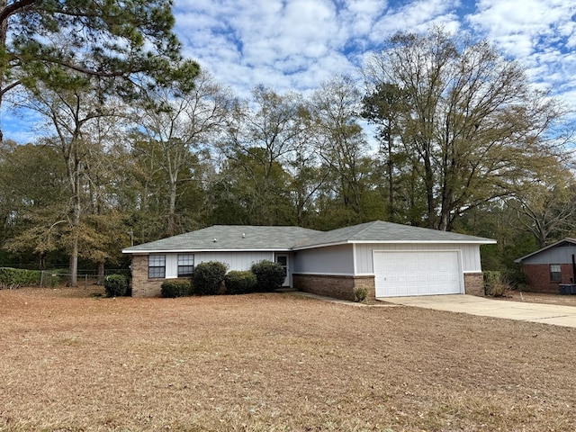 single story home with a garage