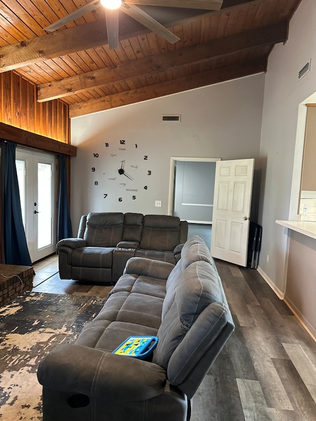 living room featuring vaulted ceiling with beams, visible vents, and ceiling fan