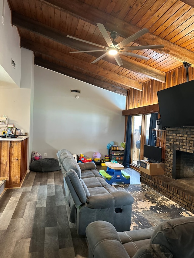 living room featuring visible vents, ceiling fan, wood ceiling, beam ceiling, and wood finished floors