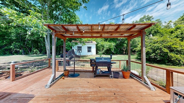 514 S Main St, Headland, AL 36345 - deck with a grill and an outbuilding