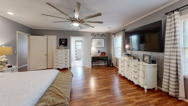 514 S Main St, Headland, AL 36345 - bedroom featuring wood finished floors, crown molding, and a ceiling fan