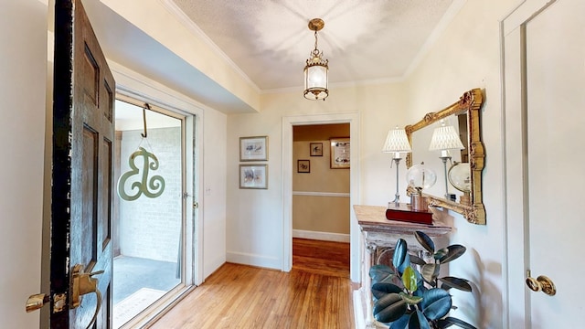 514 S Main St, Headland, AL 36345 - entrance foyer with light wood-style floors, crown molding, and baseboards