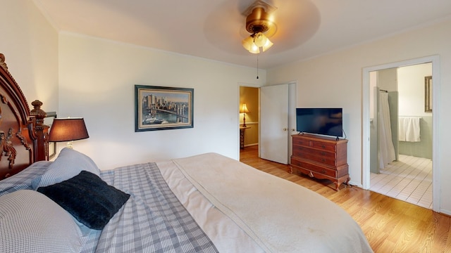 514 S Main St, Headland, AL 36345 - bedroom with wood finished floors, ornamental molding, and a ceiling fan