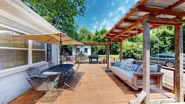 514 S Main St, Headland, AL 36345 - deck featuring an outdoor hangout area, outdoor dining area, and a grill