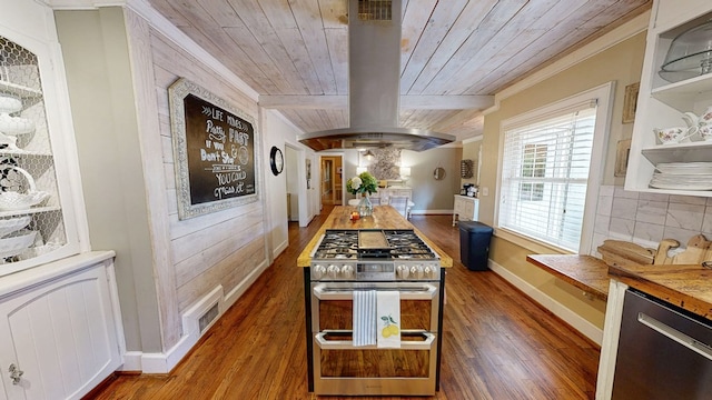 514 S Main St, Headland, AL 36345 - kitchen with stainless steel appliances, wooden ceiling, island range hood, wood finished floors, and baseboards