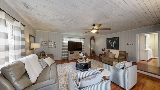 514 S Main St, Headland, AL 36345 - living room with crown molding, plenty of natural light, wood finished floors, wooden ceiling, and ceiling fan