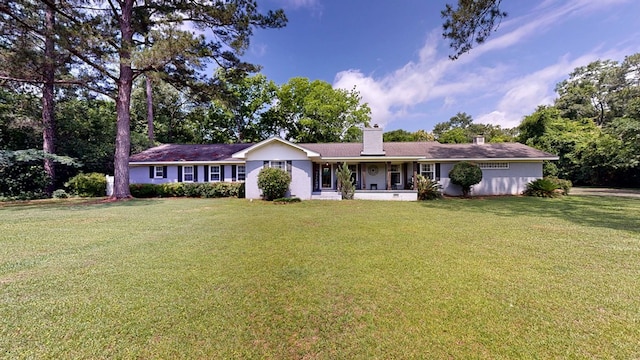 514 S Main St, Headland, AL 36345 - single story home featuring a front lawn, a chimney, and a porch