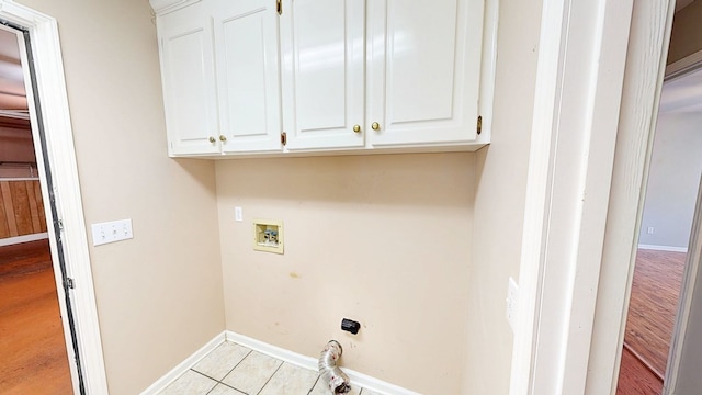 412 Darlington Cir, Dothan, AL 36301 - laundry room with washer hookup, cabinet space, and baseboards