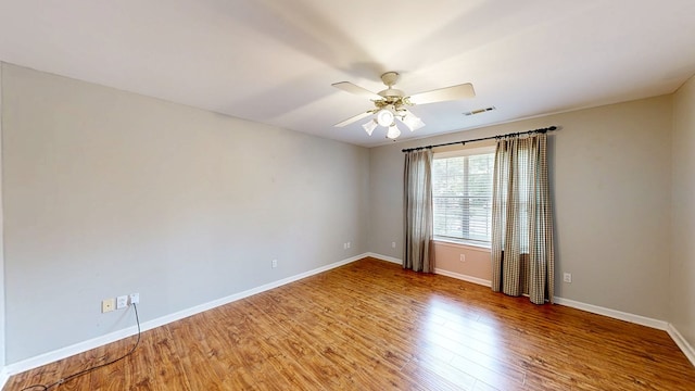 412 Darlington Cir, Dothan, AL 36301 - empty room with ceiling fan, baseboards, and light wood-style flooring