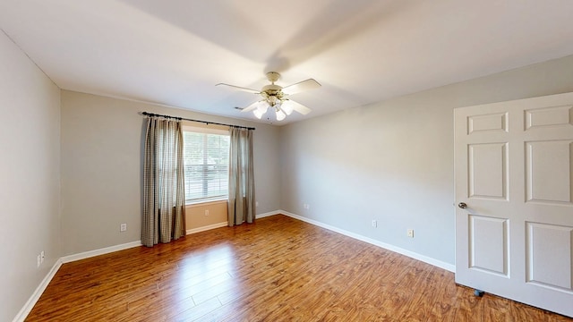 412 Darlington Cir, Dothan, AL 36301 - spare room with a ceiling fan, light wood-style flooring, and baseboards