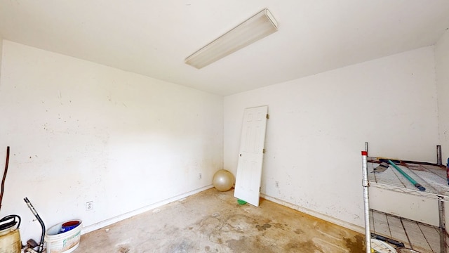 412 Darlington Cir, Dothan, AL 36301 - unfurnished bedroom with concrete flooring and baseboards
