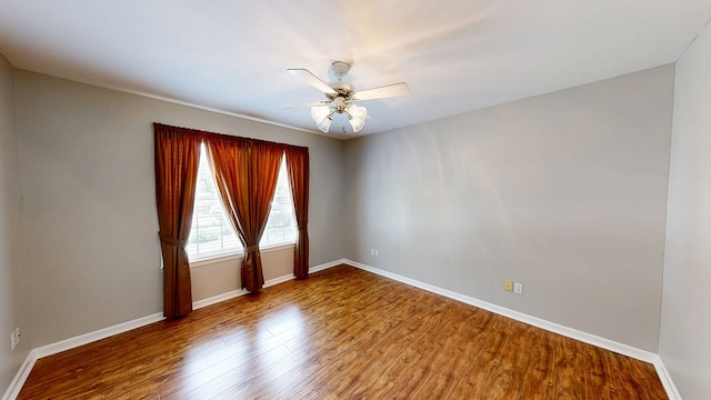 412 Darlington Cir, Dothan, AL 36301 - empty room featuring wood finished floors, ceiling fan, and baseboards