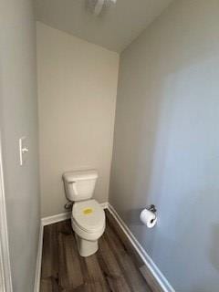 bathroom featuring toilet and hardwood / wood-style floors