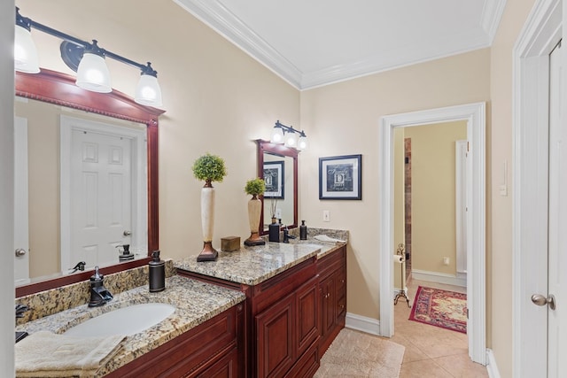 bathroom with tile patterned floors, vanity, and crown molding