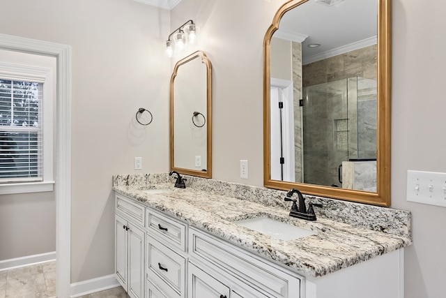 bathroom with crown molding, vanity, and an enclosed shower