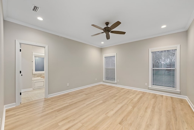 empty room with light hardwood / wood-style flooring, ceiling fan, and ornamental molding