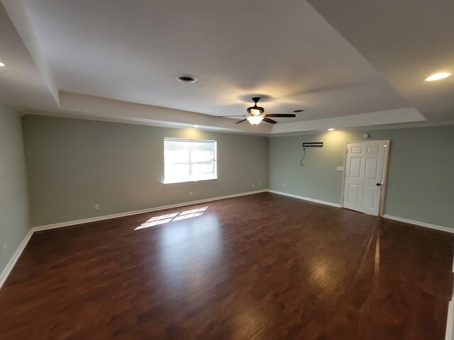 952 Easterling Mill Rd, Ariton, AL 36311 - empty room featuring a raised ceiling, ceiling fan, dark wood-type flooring, and recessed lighting