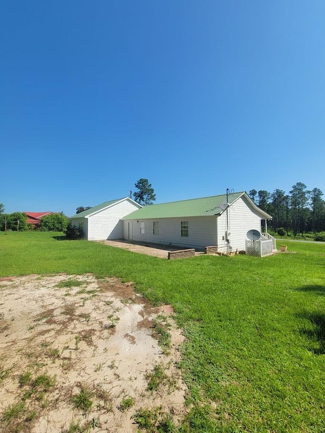 952 Easterling Mill Rd, Ariton, AL 36311 - rear view of house featuring a yard