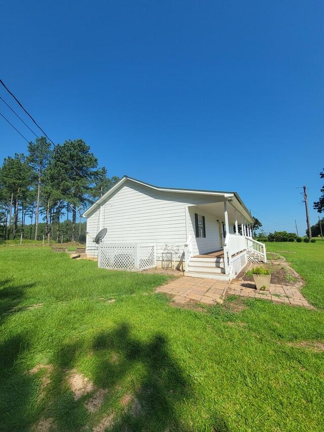 952 Easterling Mill Rd, Ariton, AL 36311 - back of property with a yard