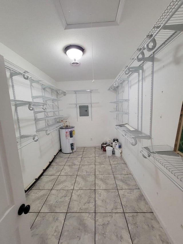 952 Easterling Mill Rd, Ariton, AL 36311 - spacious closet featuring electric water heater, electric panel, and attic access