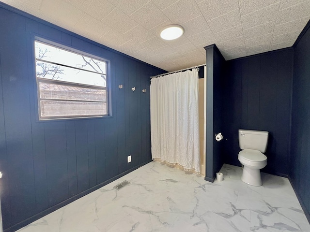 full bathroom with visible vents, marble finish floor, toilet, and a shower with shower curtain