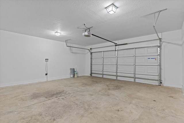 garage with baseboards and a garage door opener