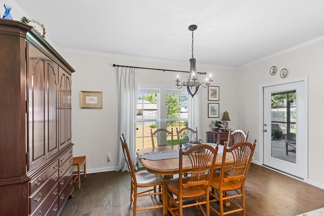 dining area featuring dark wood-style floors, a wealth of natural light, and crown molding