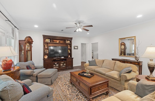 living room featuring recessed lighting and crown molding