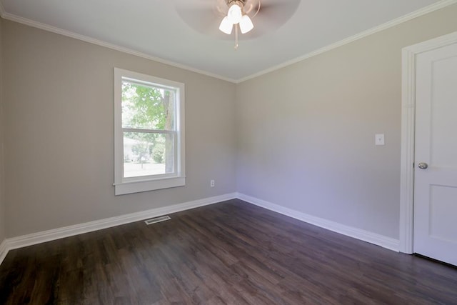 spare room with ceiling fan, dark wood-type flooring, and ornamental molding