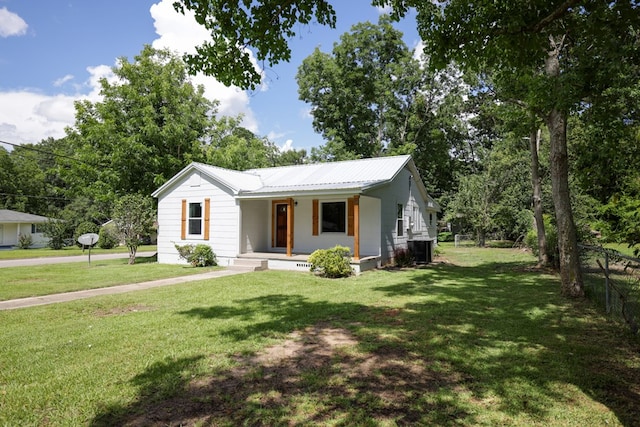 ranch-style home with a porch and a front yard