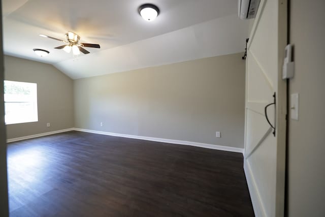 additional living space with ceiling fan, dark wood-type flooring, and vaulted ceiling