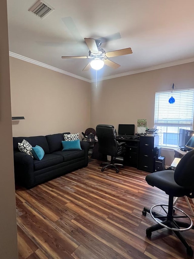 office featuring crown molding, visible vents, ceiling fan, and wood finished floors