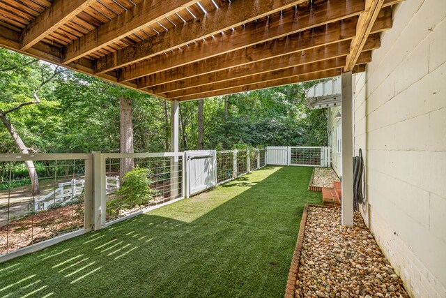 702 W Lee St, Enterprise, AL 36330 - fenced backyard featuring view of scattered trees