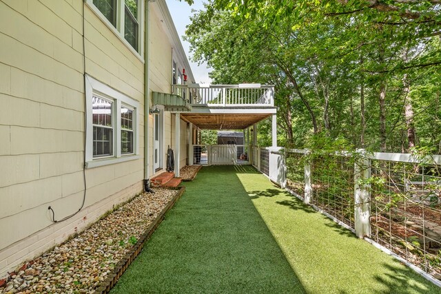 702 W Lee St, Enterprise, AL 36330 - fenced backyard featuring a wooden deck