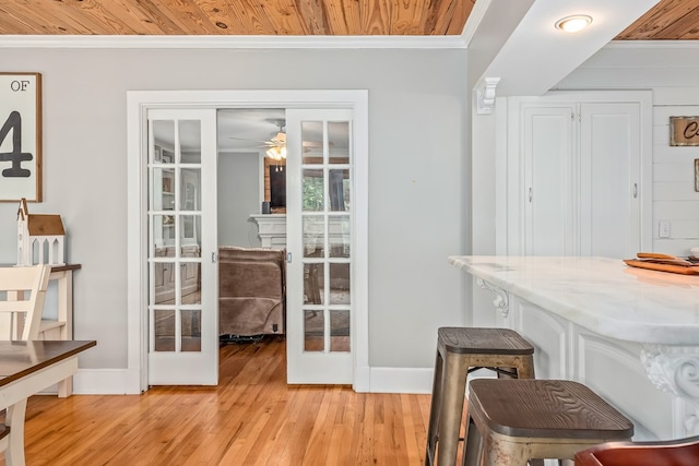 702 W Lee St, Enterprise, AL 36330 - dining area featuring ornamental molding, french doors, light wood-style floors, and a ceiling fan