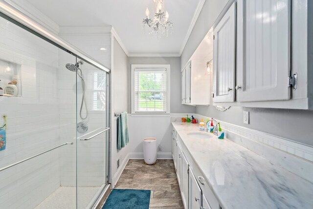 702 W Lee St, Enterprise, AL 36330 - full bathroom with ornamental molding, a stall shower, vanity, and a chandelier