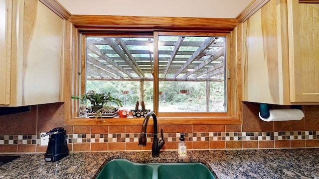 1622 W Main St, Daleville, AL 36322 - kitchen view of a sink, tasteful backsplash, and dark stone countertops