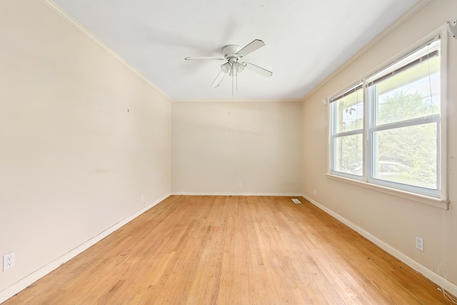 803 Dogwood Trl, Dothan, AL 36301 - empty room with light wood-style flooring, ornamental molding, and a ceiling fan