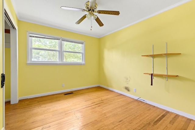 803 Dogwood Trl, Dothan, AL 36301 - unfurnished bedroom featuring light wood-type flooring, crown molding, a closet, and ceiling fan