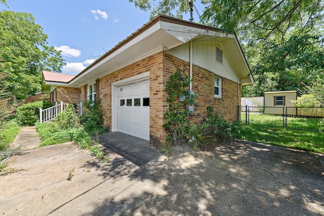 803 Dogwood Trl, Dothan, AL 36301 - view of home's exterior with brick siding, concrete driveway, and a garage