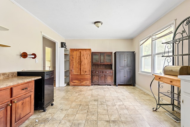 803 Dogwood Trl, Dothan, AL 36301 - kitchen with open shelves, ornamental molding, glass insert cabinets, light countertops, and brown cabinets