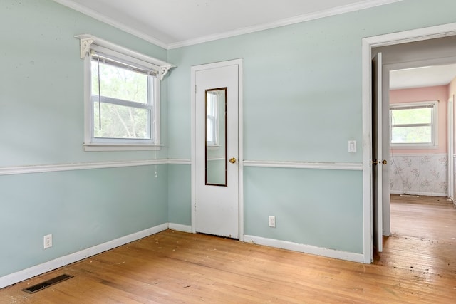 803 Dogwood Trl, Dothan, AL 36301 - empty room with hardwood / wood-style floors and crown molding