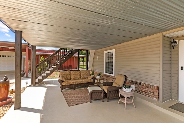 view of patio featuring an outdoor hangout area and stairway